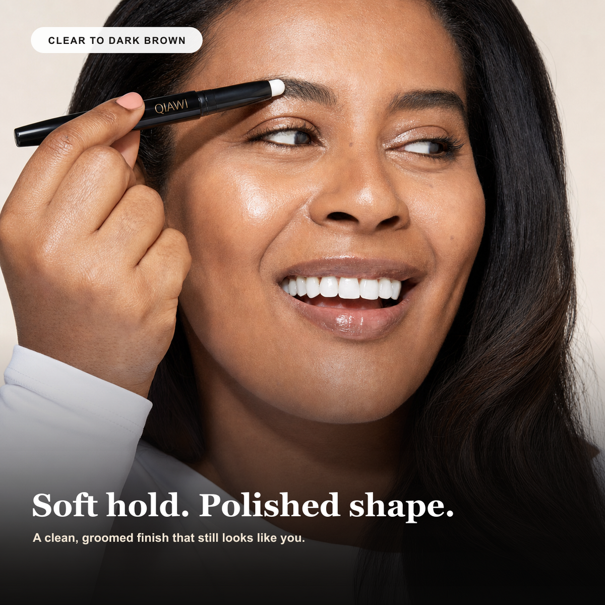 Adult woman applying QIAWI brow lifting pomade